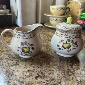 English china with fruit, cream and sugar dishes